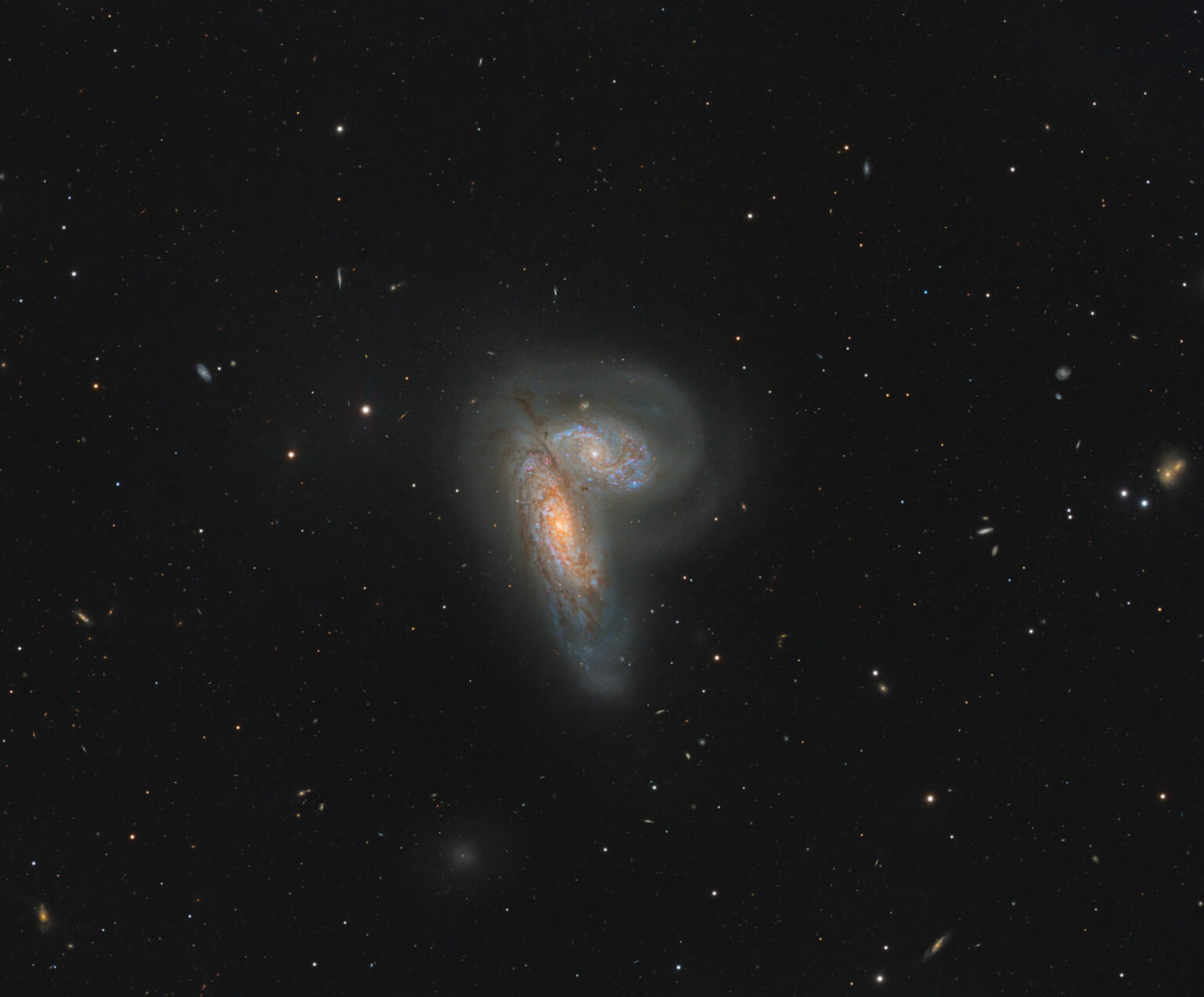 NGC 4567 – Through Light and Time